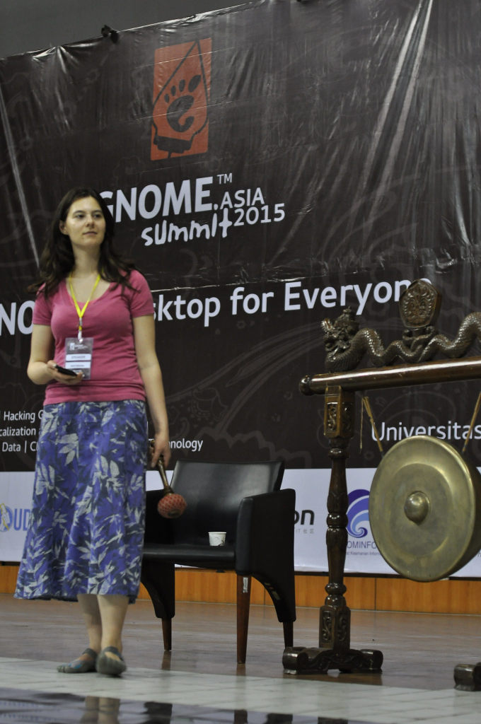 Kate and her gong :D - Taken by GNOME Asia Summit 2015 Local Committee  – https://creativecommons.org/licenses/by-nc/2.0/