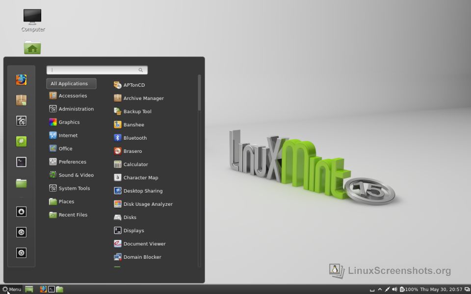 Seperti inilah desktop Cinnamon, gambar nyolong lagi dari http://www.linuxscreenshots.org/?release=Linux%20Mint%2015%20Cinnamon